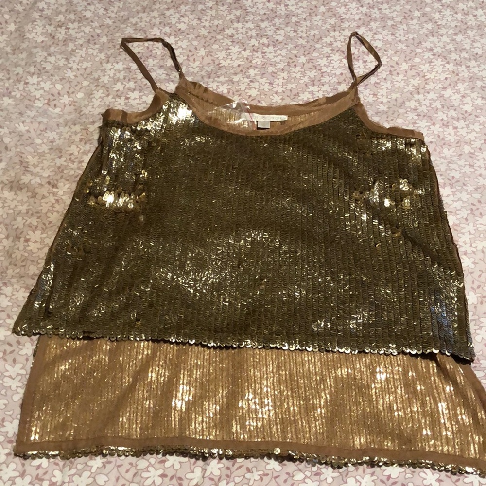 Date night too. High low bottom. Gold tank top